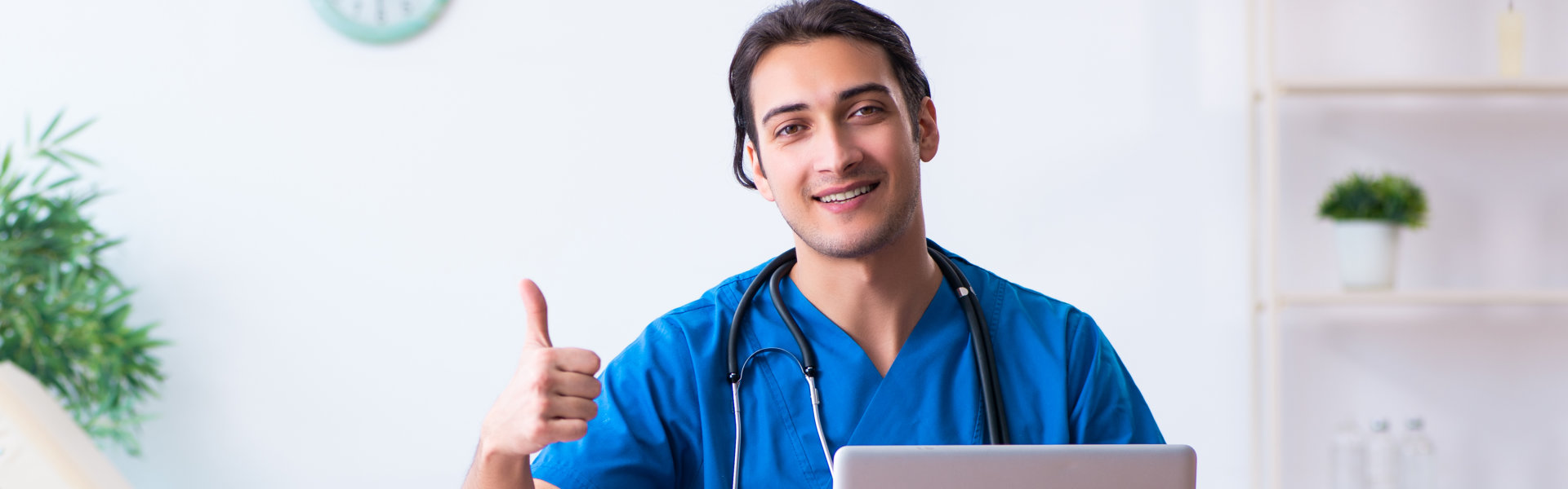 healthcare worker showing thumbs up